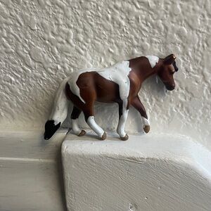 Brown and White Horse Figurine
